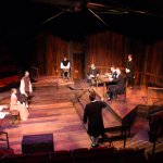 Construction and finishing of table, benches, and special downstage crates for Crucible.